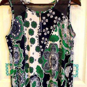 Medium casual dressy tank. Navy and white with a pops of green